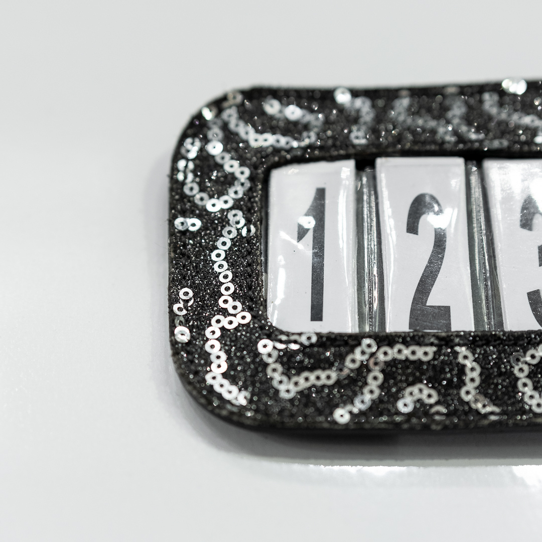 Portanumero da gara glitterato