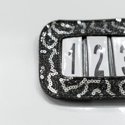 Portanumero da gara glitterato