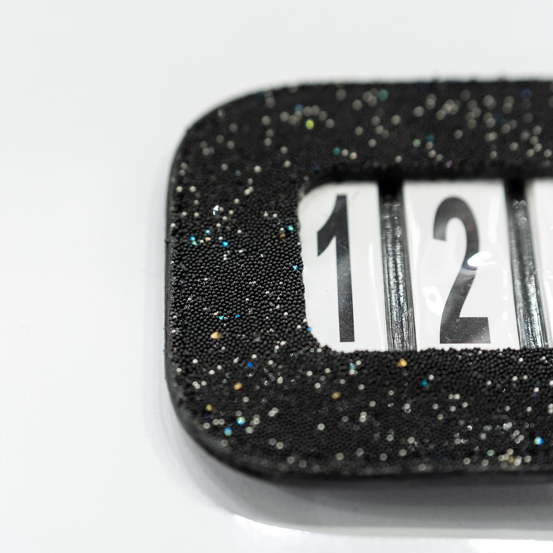 Portanumero da gara glitterato