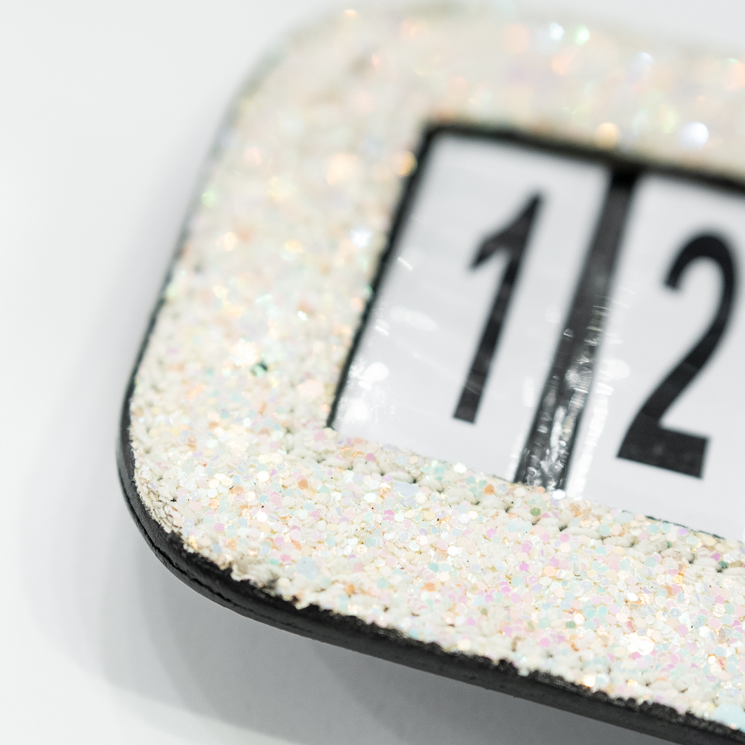 Portanumero da gara glitterato